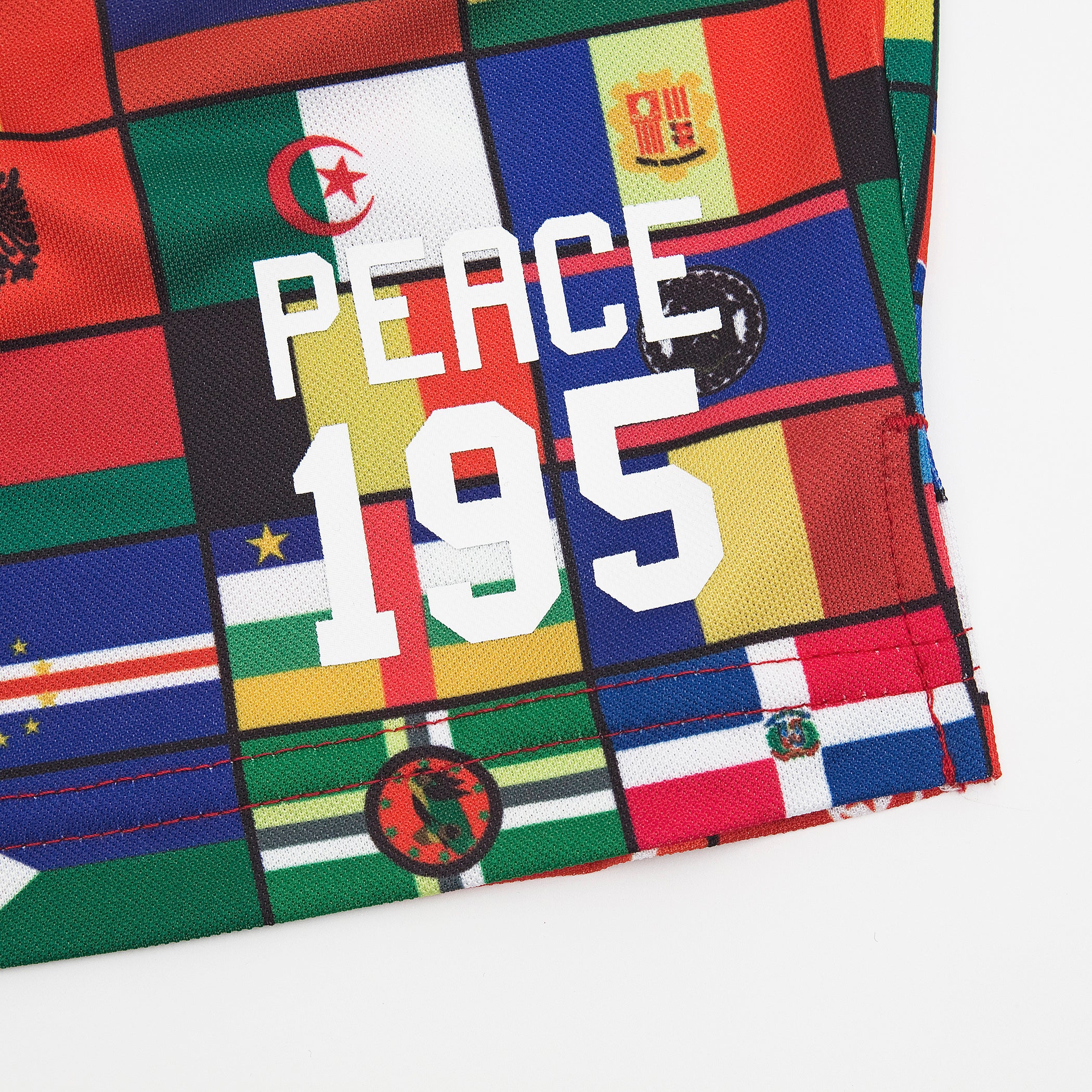 UMBRO x AKOMPLICE PEACE NYLON SHORT