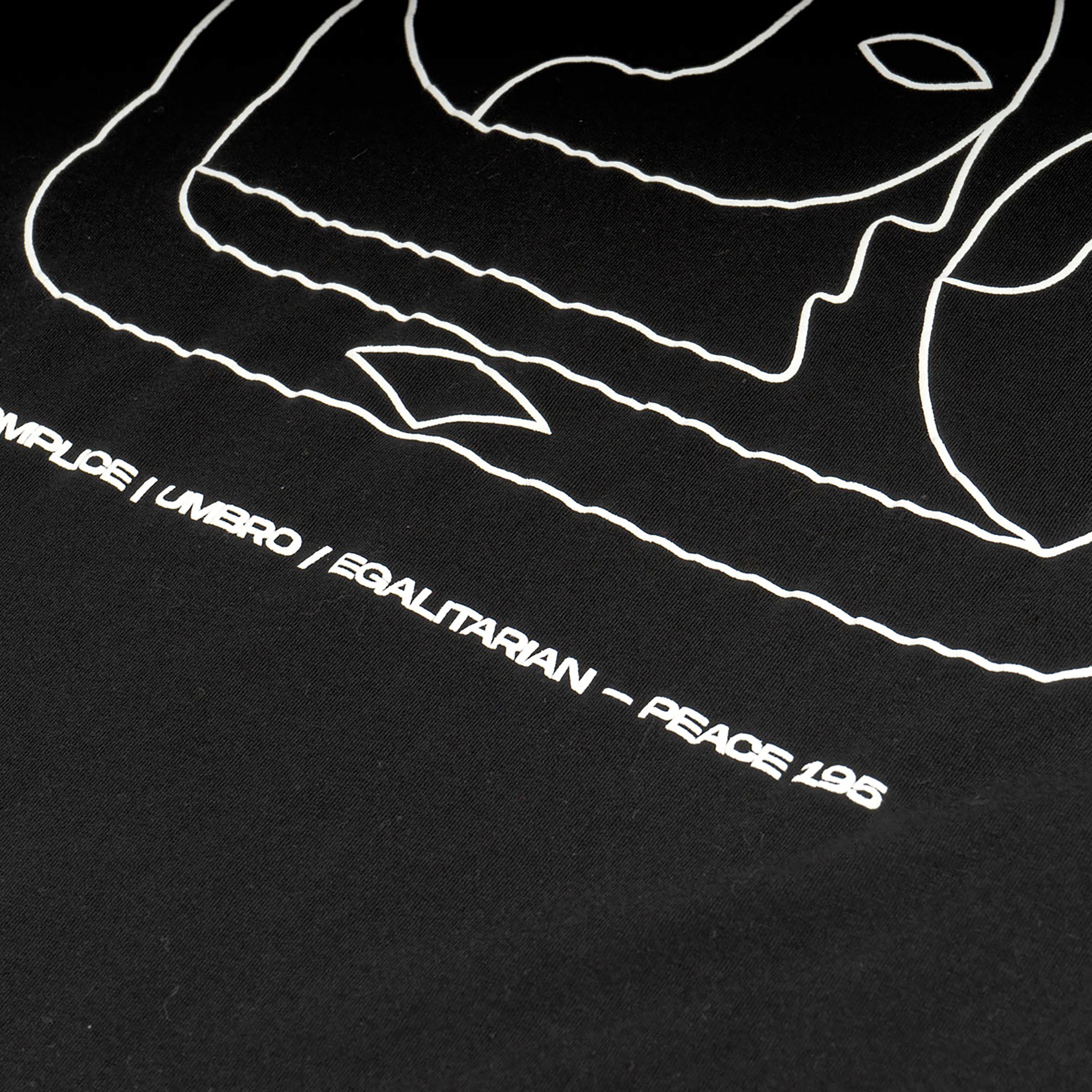 UMBRO x AKOMPLICE MENS WE ARE UNO S/S TSHIRT