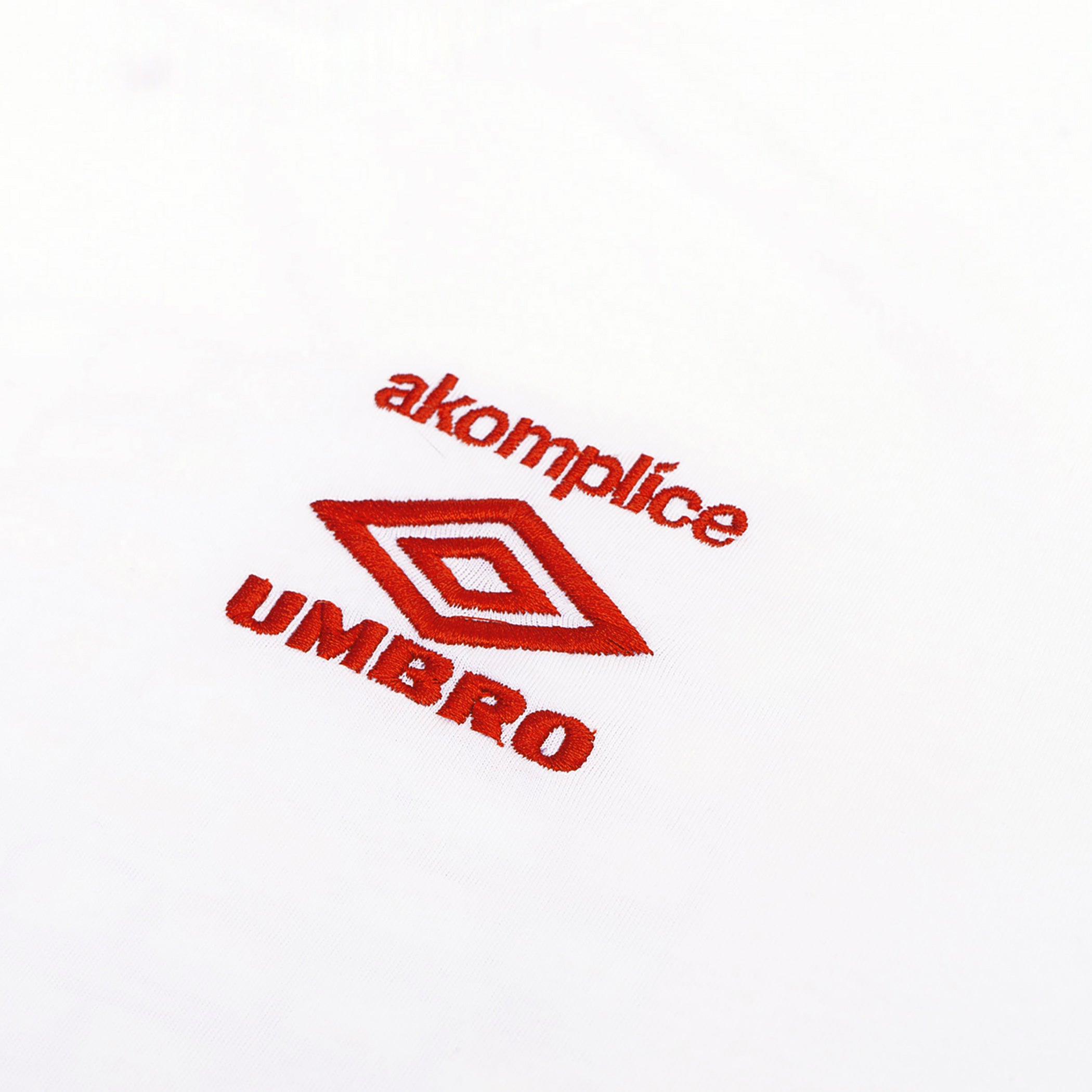 UMBRO x AKOMPLICE WORLD PEACE SS TEE